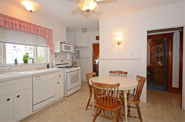 49 Katherine Road Watertown, MA 02472 - Photo 8 of 30 a view of a dining room and kitchen with a table chairs a workspace