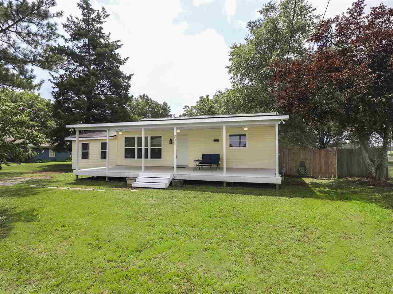 204 Proctor Street Zebulon, NC 27597 - Photo 2 of 30 a view of a house with a yard