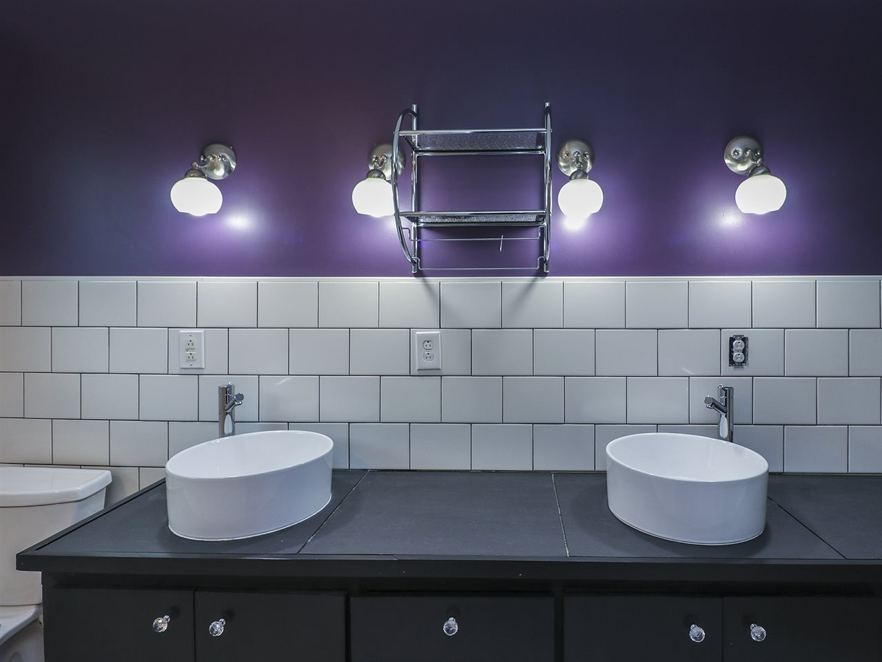 204 Proctor Street Zebulon, NC 27597 - Photo 29 of 30 a bathroom with a sink and a mirror