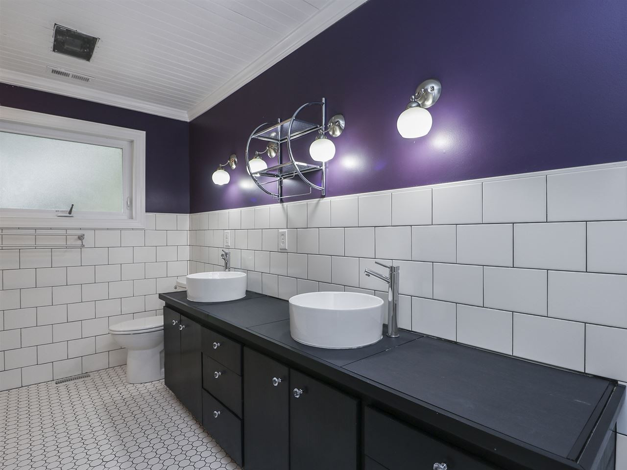 204 Proctor Street Zebulon, NC 27597 - Photo 30 of 30 a bathroom with a sink and a mirror