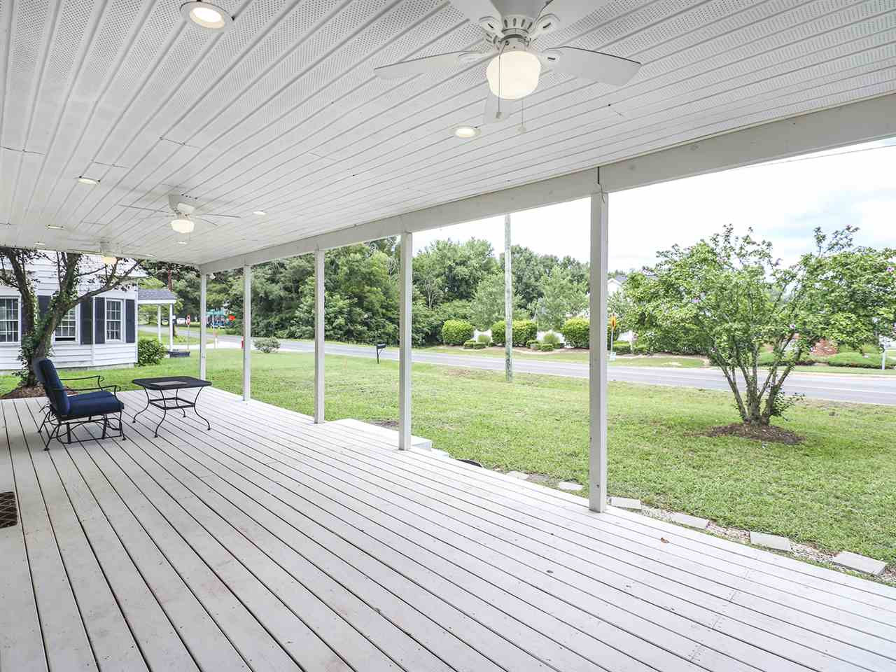 204 Proctor Street Zebulon, NC 27597 - Photo 3 of 30 a view of a house with a backyard