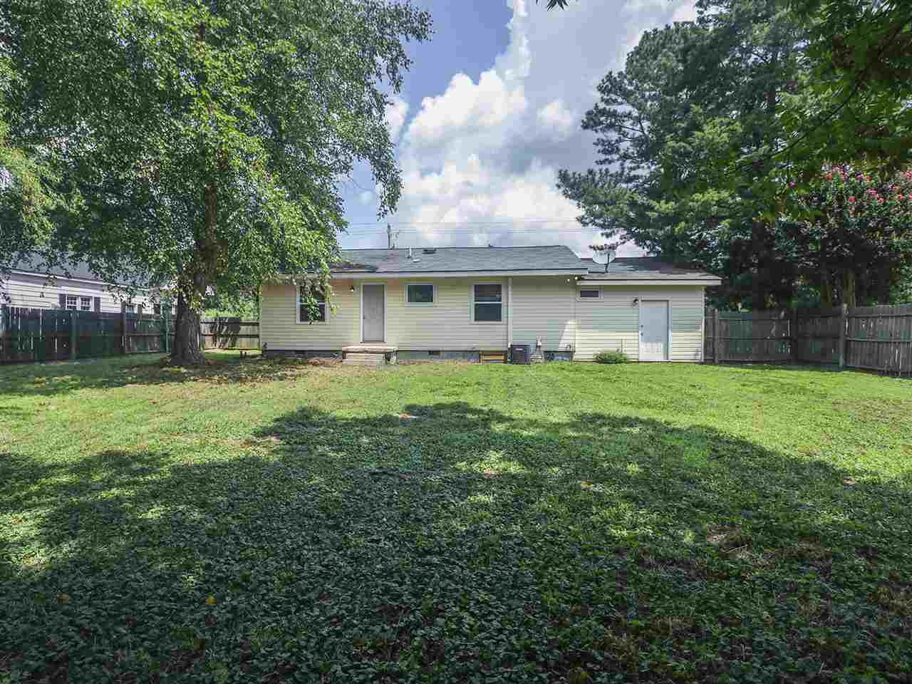 204 Proctor Street Zebulon, NC 27597 - Photo 5 of 30 a front view of house with yard and green space