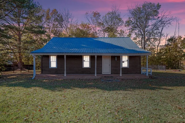 a house that has a tree in it
