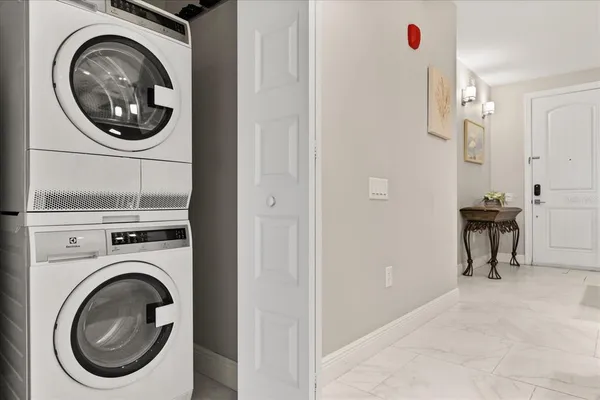 a view of a storage & utility room with washer and dryer