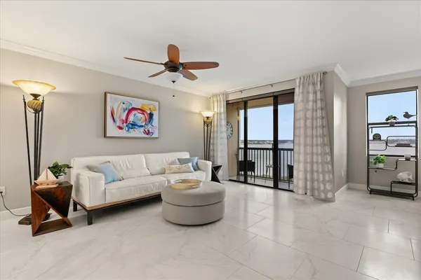 a living room with furniture and a window