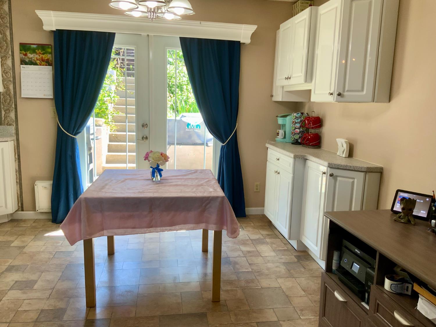 2367 Ponderosa Road Rescue, CA 95672 - Photo 23 of 76 a kitchen with stainless steel appliances a table chairs in it and a window
