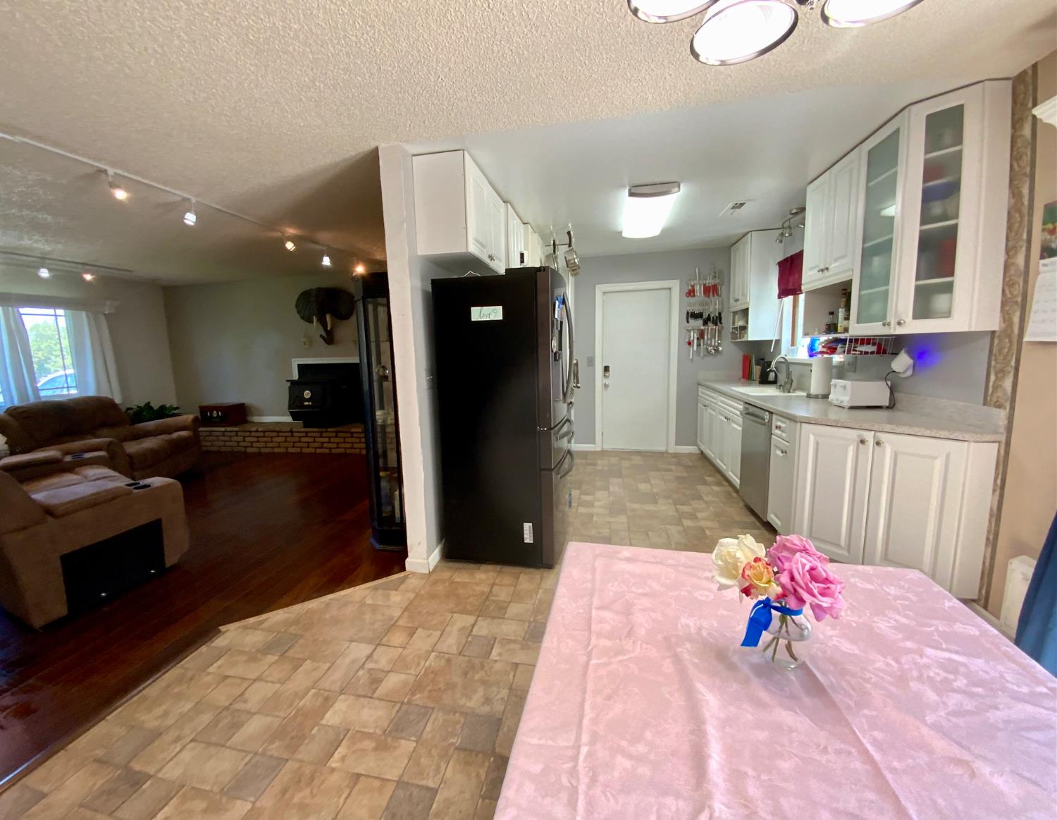 2367 Ponderosa Road Rescue, CA 95672 - Photo 25 of 76 a living room with stainless steel appliances kitchen island granite countertop furniture and a kitchen view