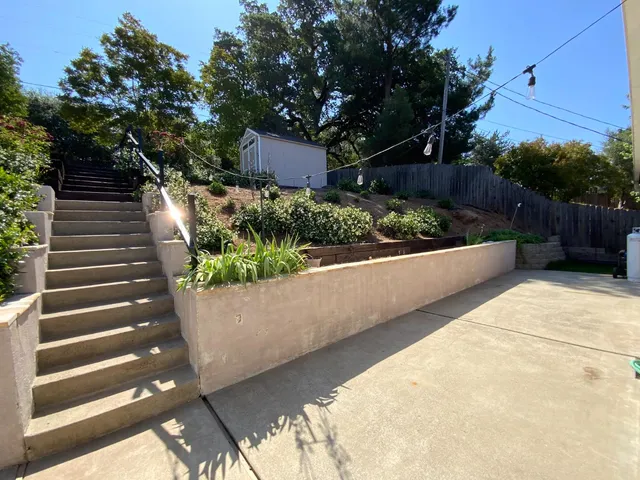a view of yard from outdoor seating