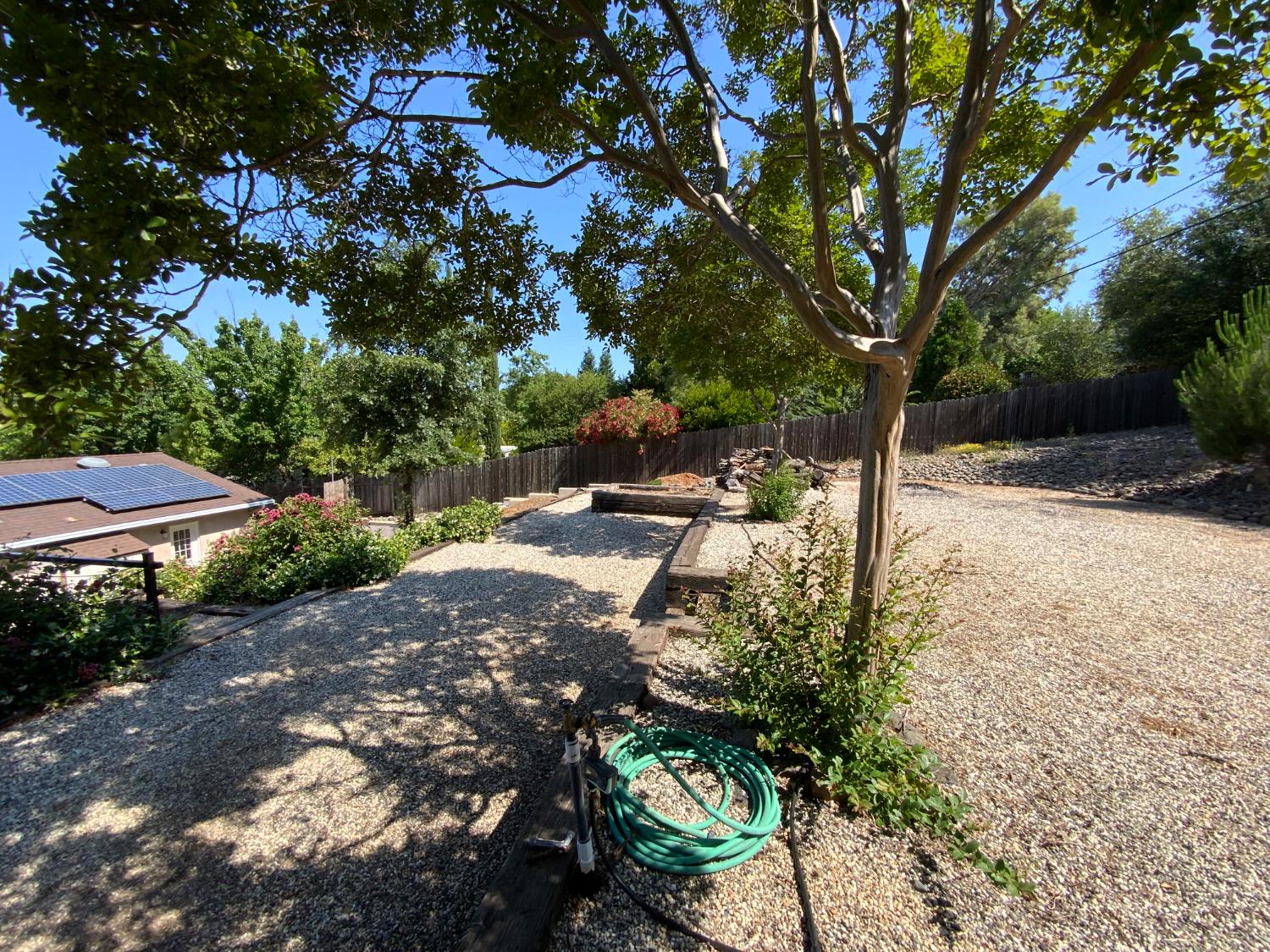 2367 Ponderosa Road Rescue, CA 95672 - Photo 35 of 76 a backyard of a house with a yard and outdoor seating