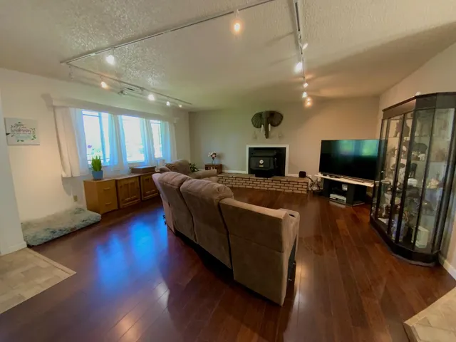 a bedroom with a bed and a desk