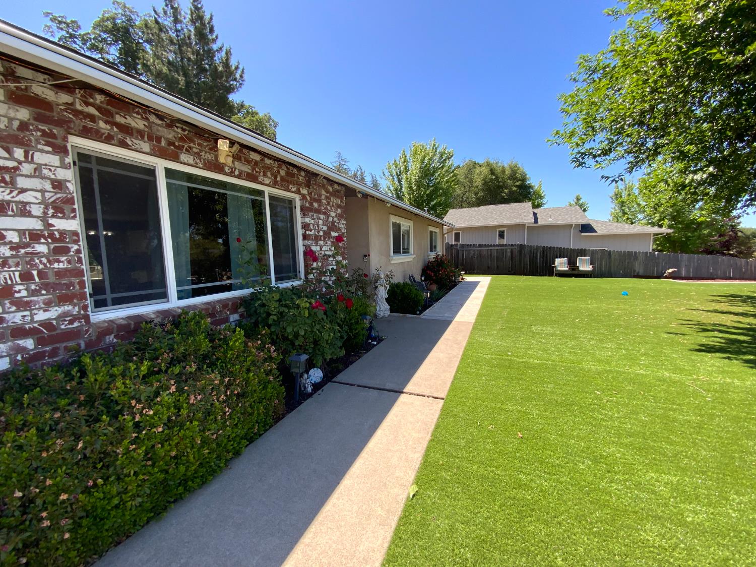 2367 Ponderosa Road Rescue, CA 95672 - Photo 42 of 76 a view of a house with backyard and garden
