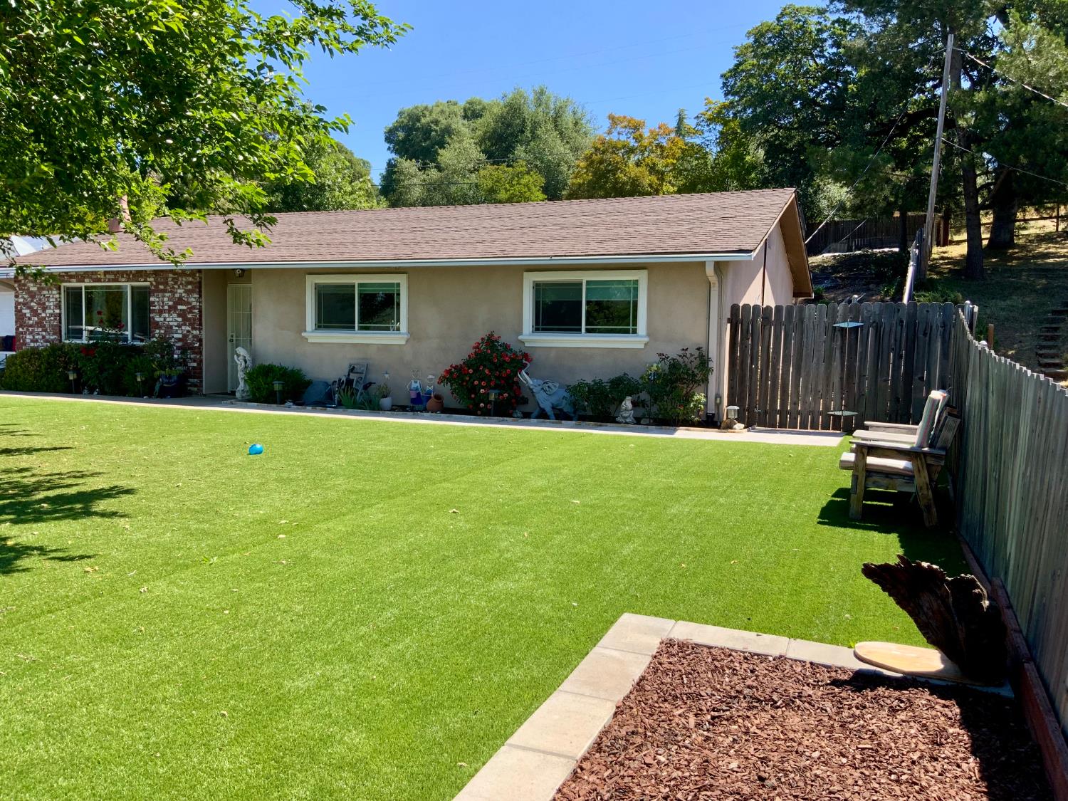 2367 Ponderosa Road Rescue, CA 95672 - Photo 47 of 76 a view of a house with a yard porch and sitting area