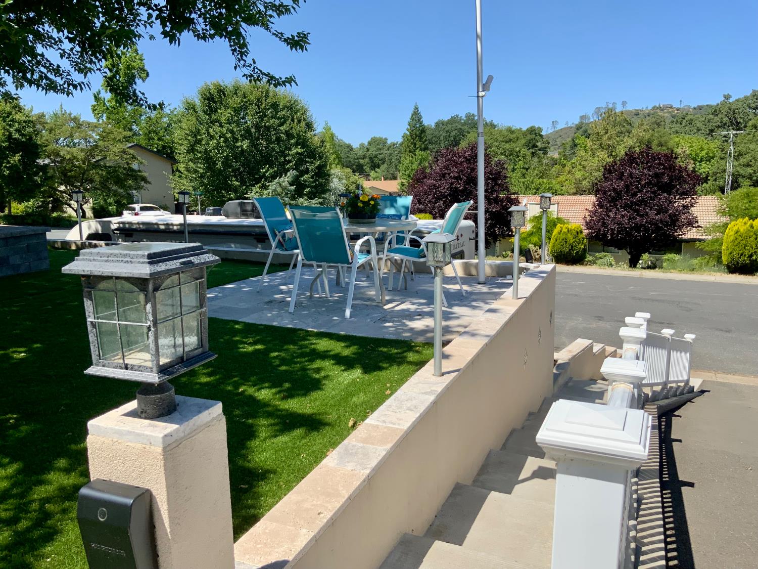 2367 Ponderosa Road Rescue, CA 95672 - Photo 48 of 76 a view of a patio with chairs and potted plants