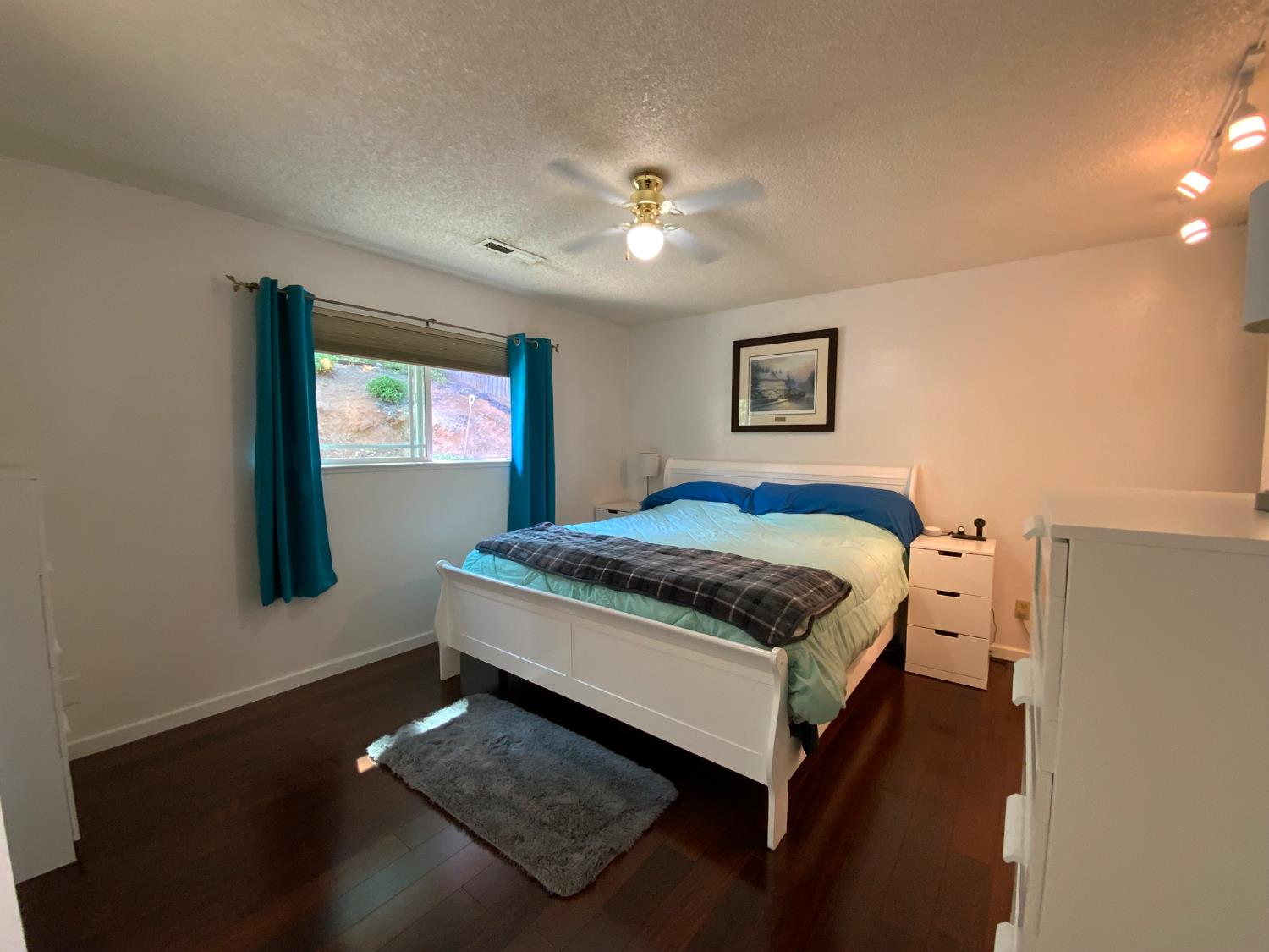 2367 Ponderosa Road Rescue, CA 95672 - Photo 61 of 76 a bedroom with a bed and a window