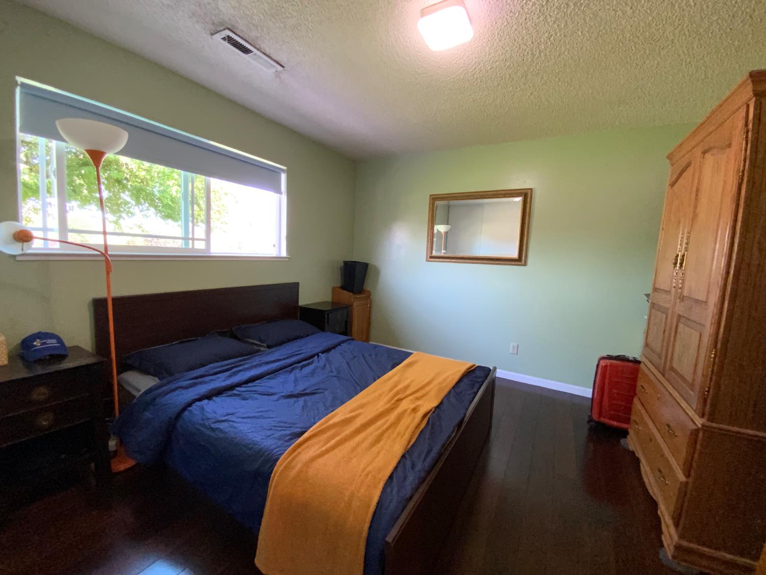 2367 Ponderosa Road Rescue, CA 95672 - Photo 63 of 76 a bedroom with a bed and a window