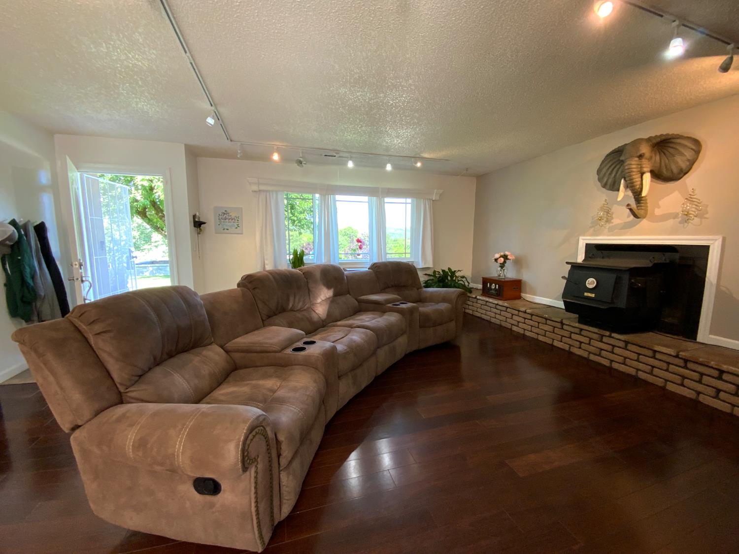 2367 Ponderosa Road Rescue, CA 95672 - Photo 65 of 76 a living room with furniture and a fireplace