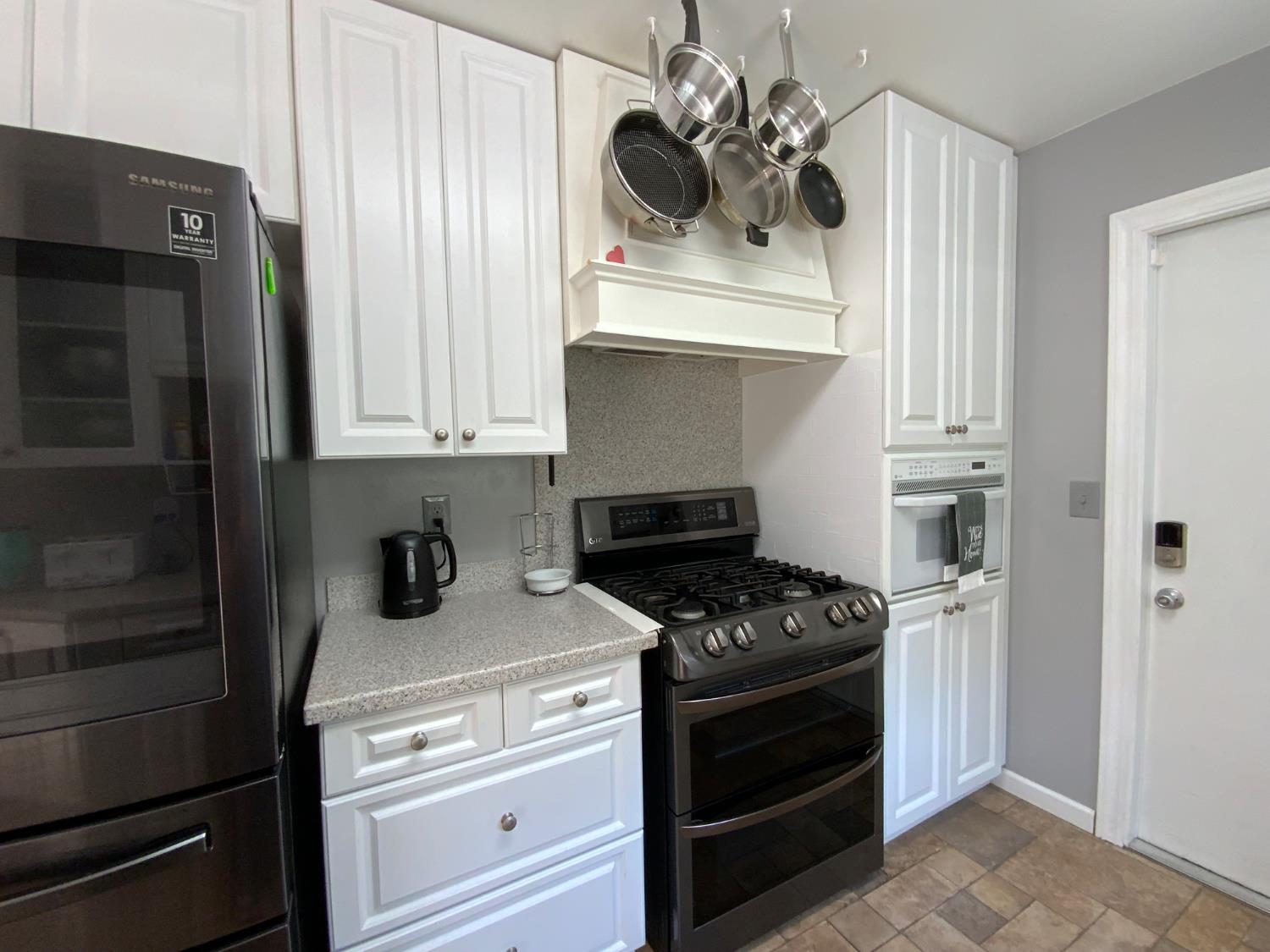 2367 Ponderosa Road Rescue, CA 95672 - Photo 69 of 76 a kitchen with a stove and a microwave