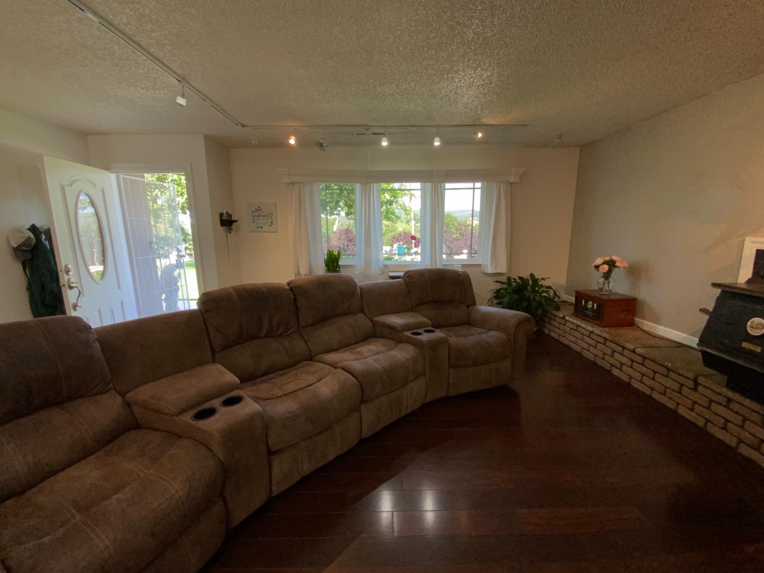 2367 Ponderosa Road Rescue, CA 95672 - Photo 71 of 76 a living room with furniture and a wooden floor