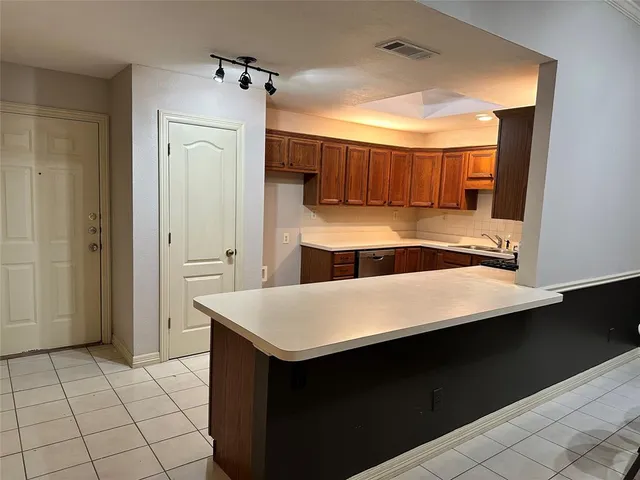 a bathroom with a sink vanity and mirror