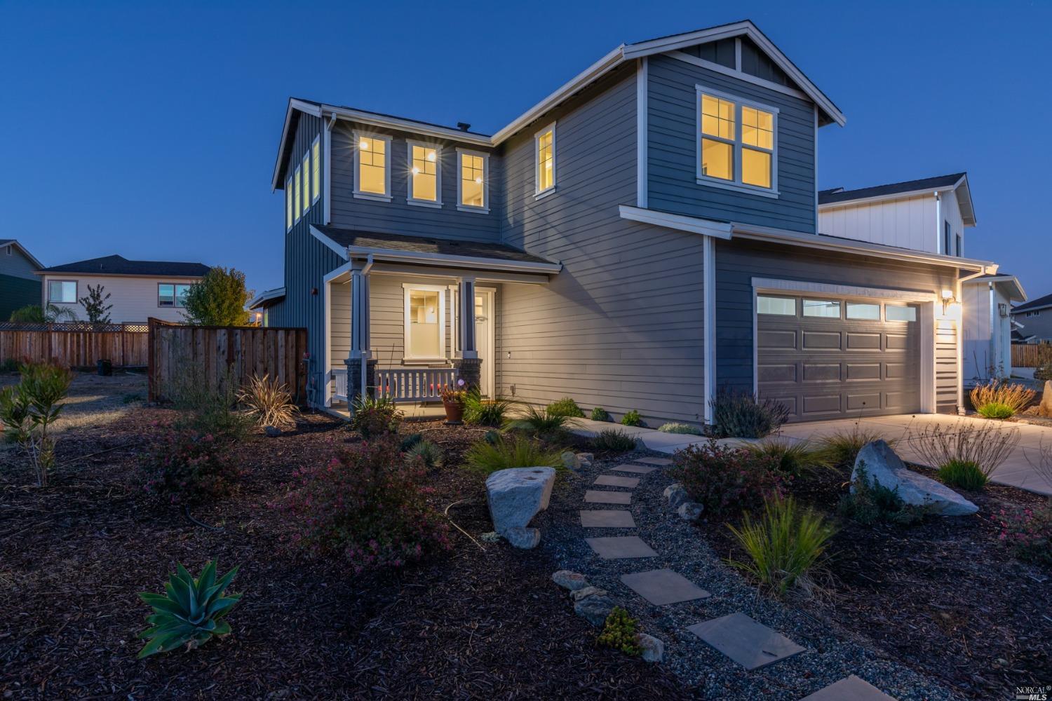 1695 Randon Way Santa Rosa, CA 95403 - Photo 1 of 1 a front view of a house with garden
