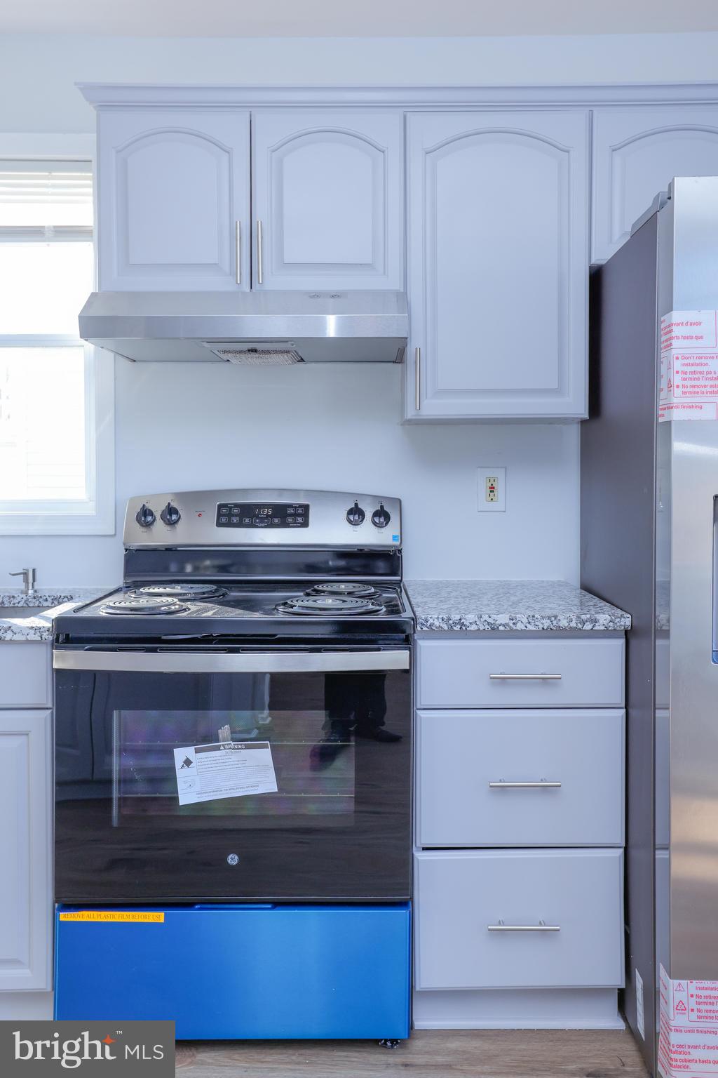 30 Queen Anne Road Glen Burnie, MD 21060 - Photo 13 of 47 a stove top oven sitting inside of a kitchen