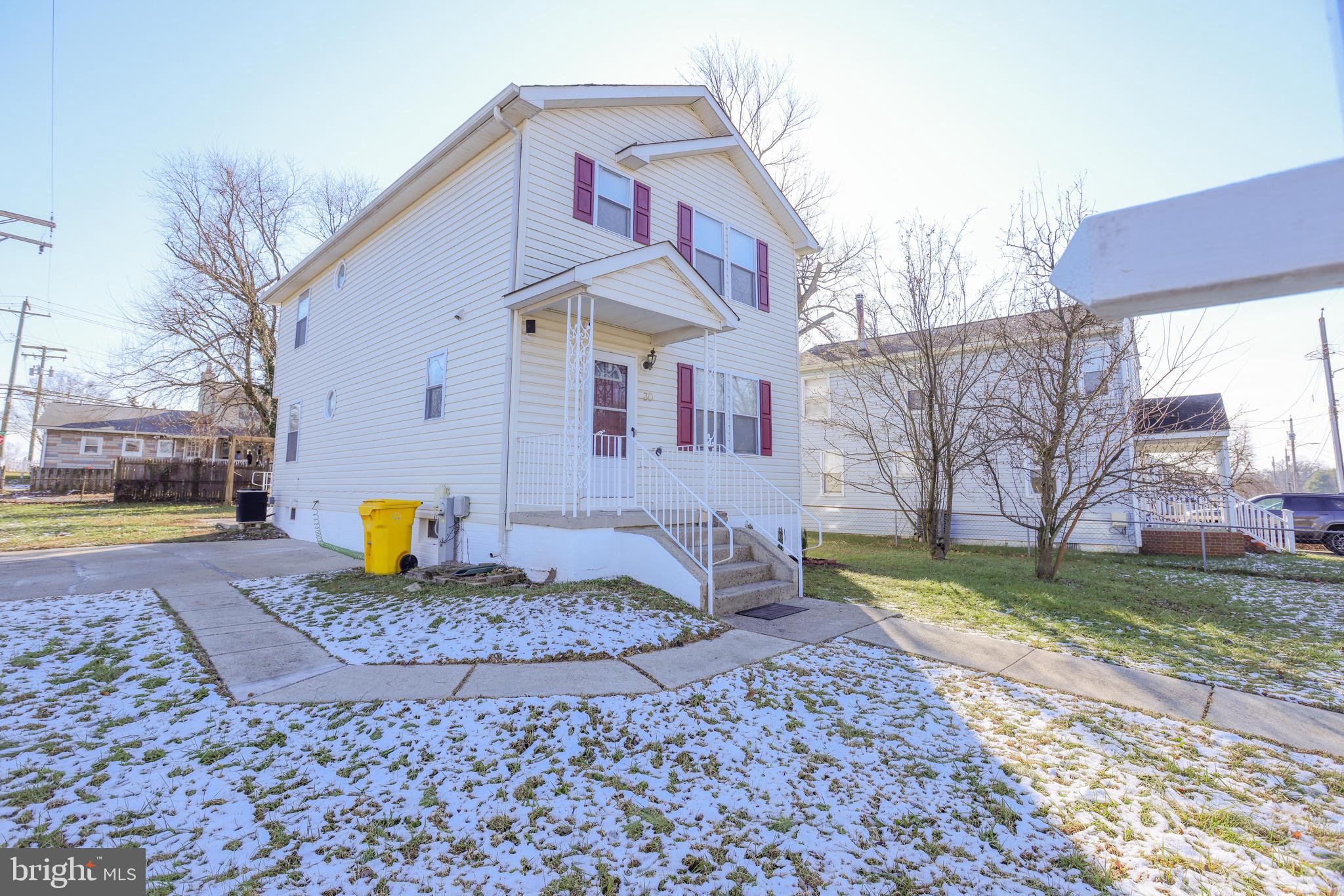 30 Queen Anne Road Glen Burnie, MD 21060 - Photo 2 of 47 a view of a house with a yard
