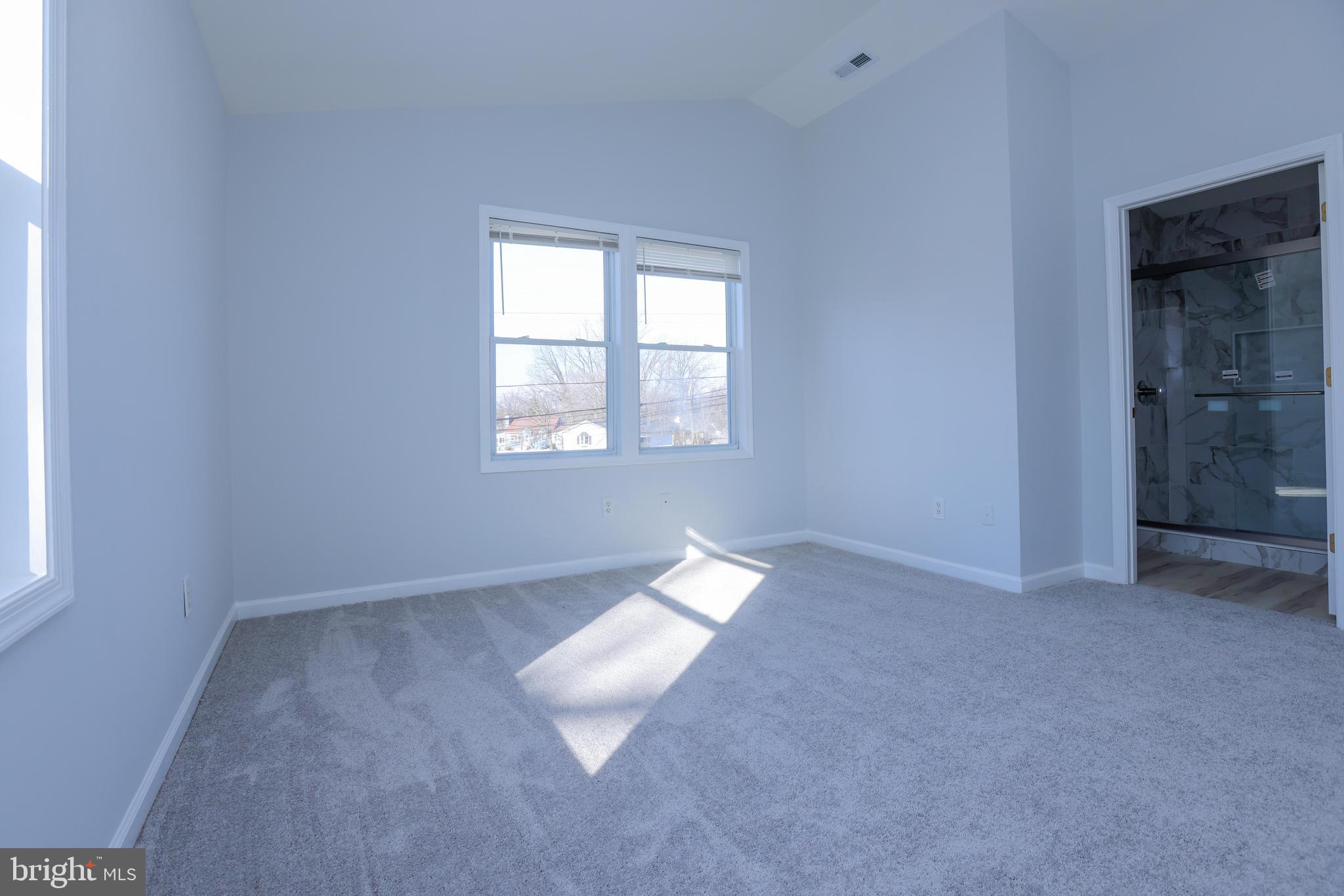30 Queen Anne Road Glen Burnie, MD 21060 - Photo 21 of 47 an empty room with windows