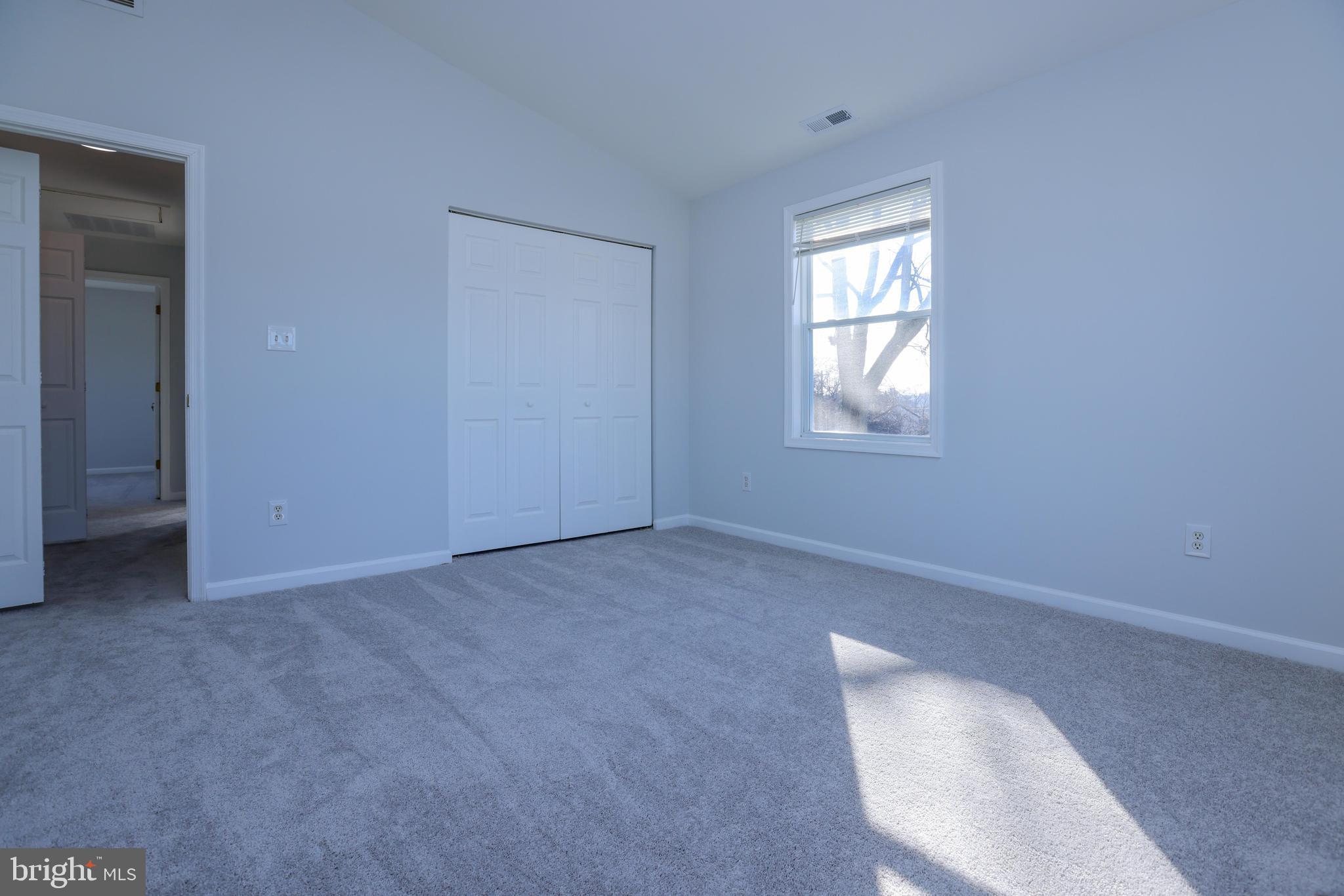 30 Queen Anne Road Glen Burnie, MD 21060 - Photo 22 of 47 an empty room with windows