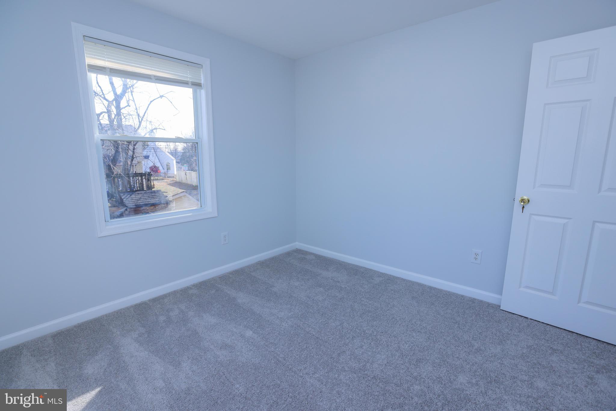 30 Queen Anne Road Glen Burnie, MD 21060 - Photo 25 of 47 an empty room with windows