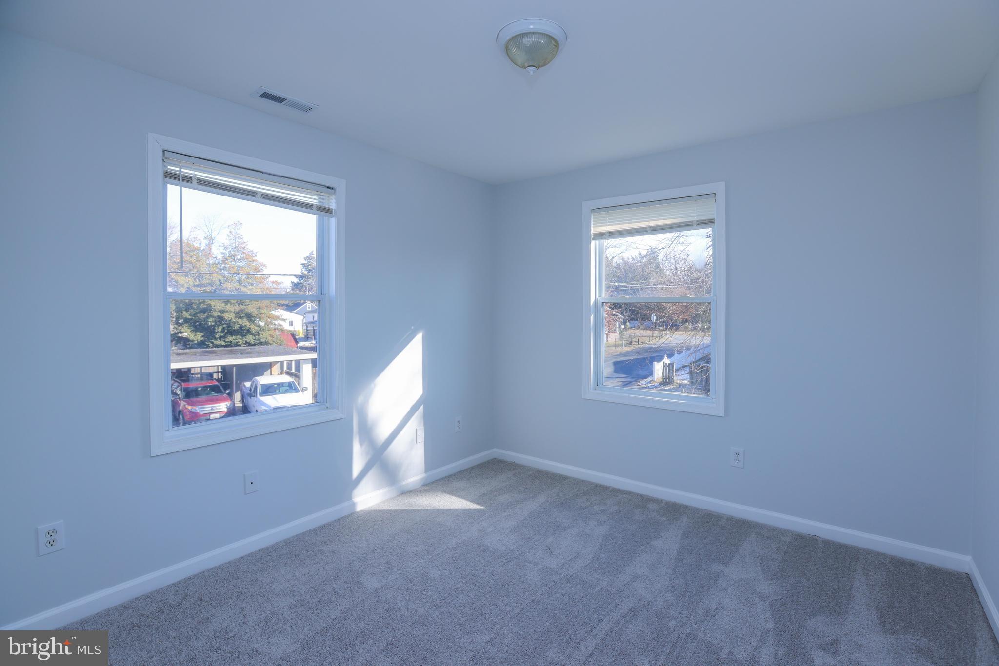 30 Queen Anne Road Glen Burnie, MD 21060 - Photo 27 of 47 a view of an empty room with a window