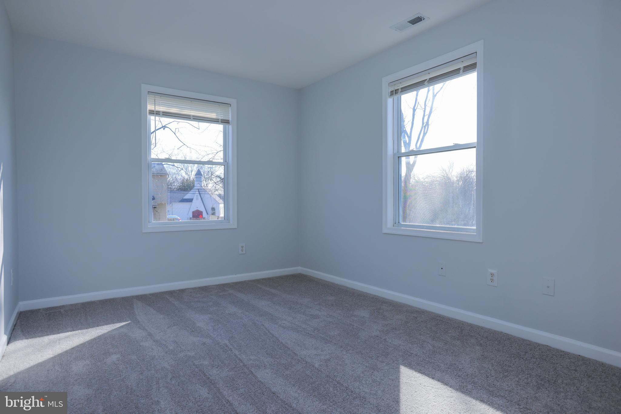 30 Queen Anne Road Glen Burnie, MD 21060 - Photo 29 of 47 an empty room with windows