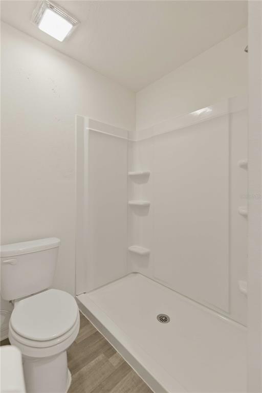 260 Emerald Road Ocala, FL 34472 - Photo 19 of 29 a bathroom with a sink and a toilet