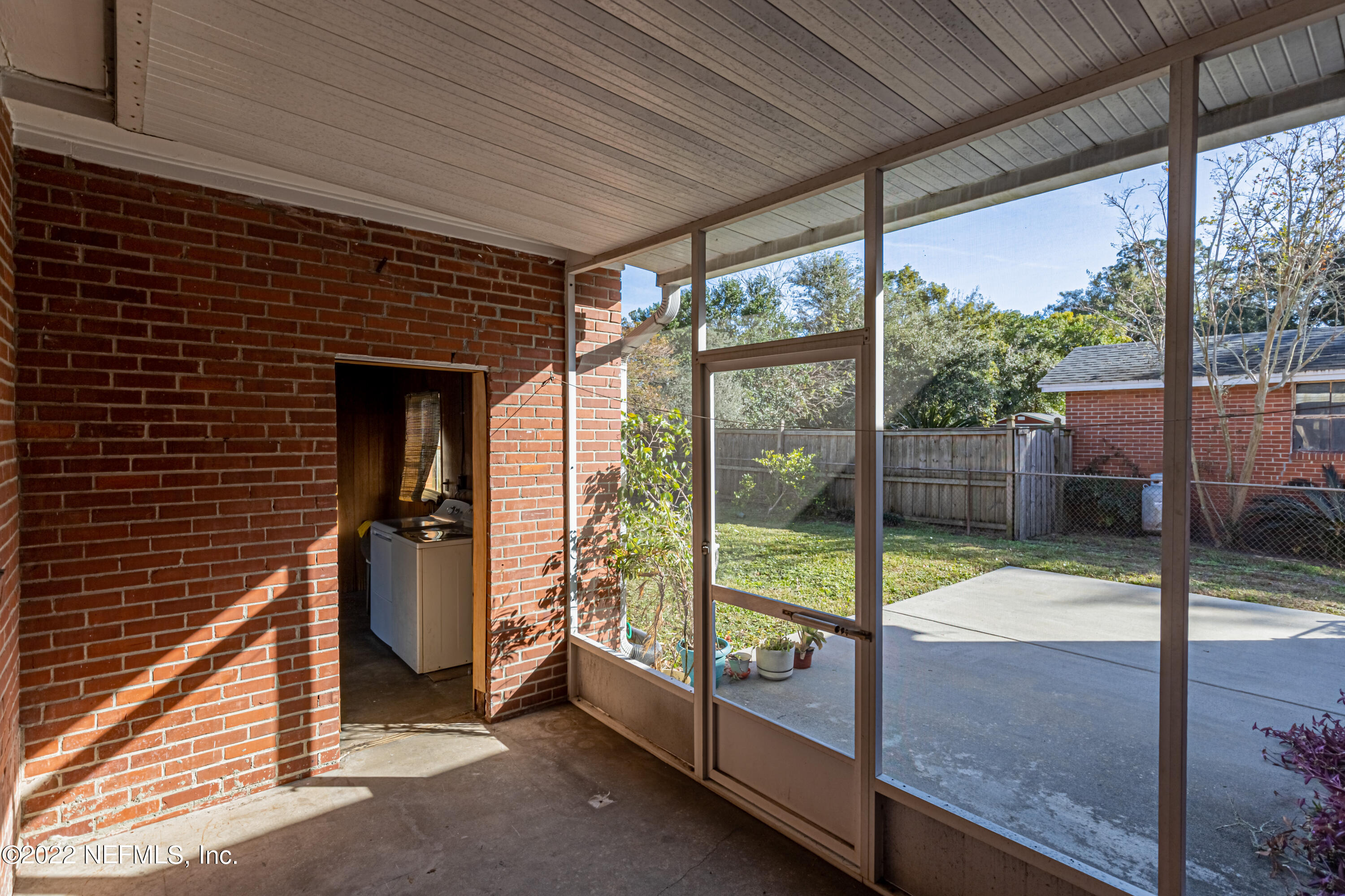 4209 Birmingham Road Jacksonville, FL 32207 - Photo 25 of 35 a view of a porch with a door