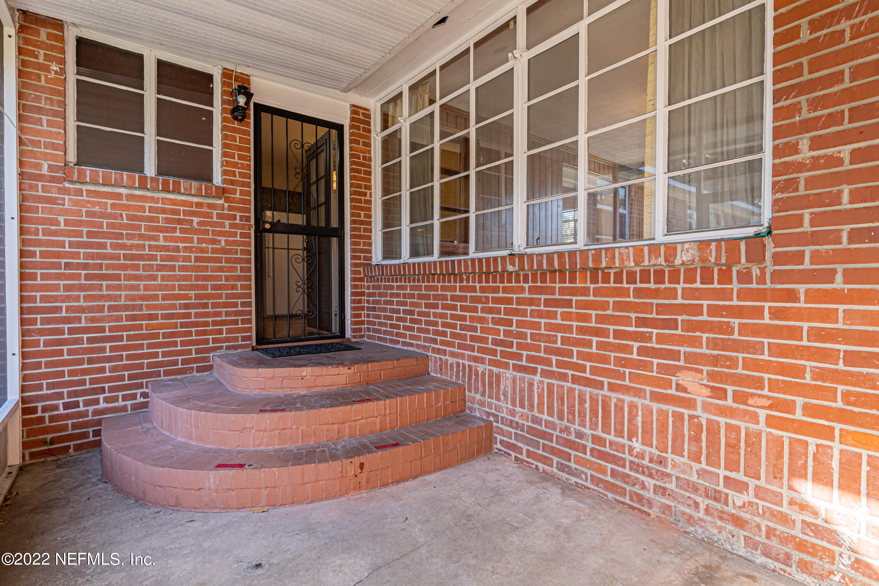 4209 Birmingham Road Jacksonville, FL 32207 - Photo 26 of 35 a view of front door of house with window