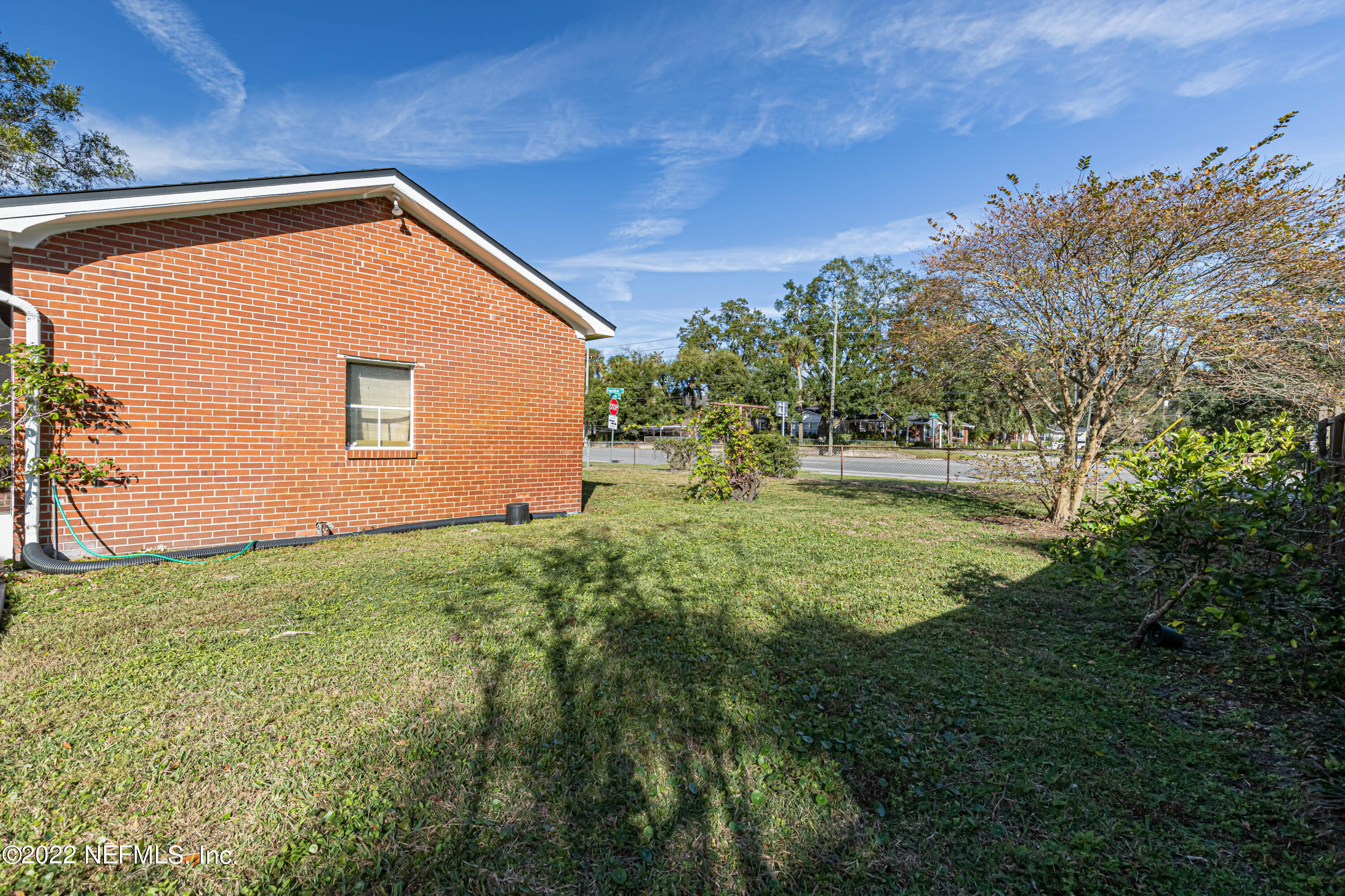 4209 Birmingham Road Jacksonville, FL 32207 - Photo 30 of 35 a view of a backyard with plants and a garden