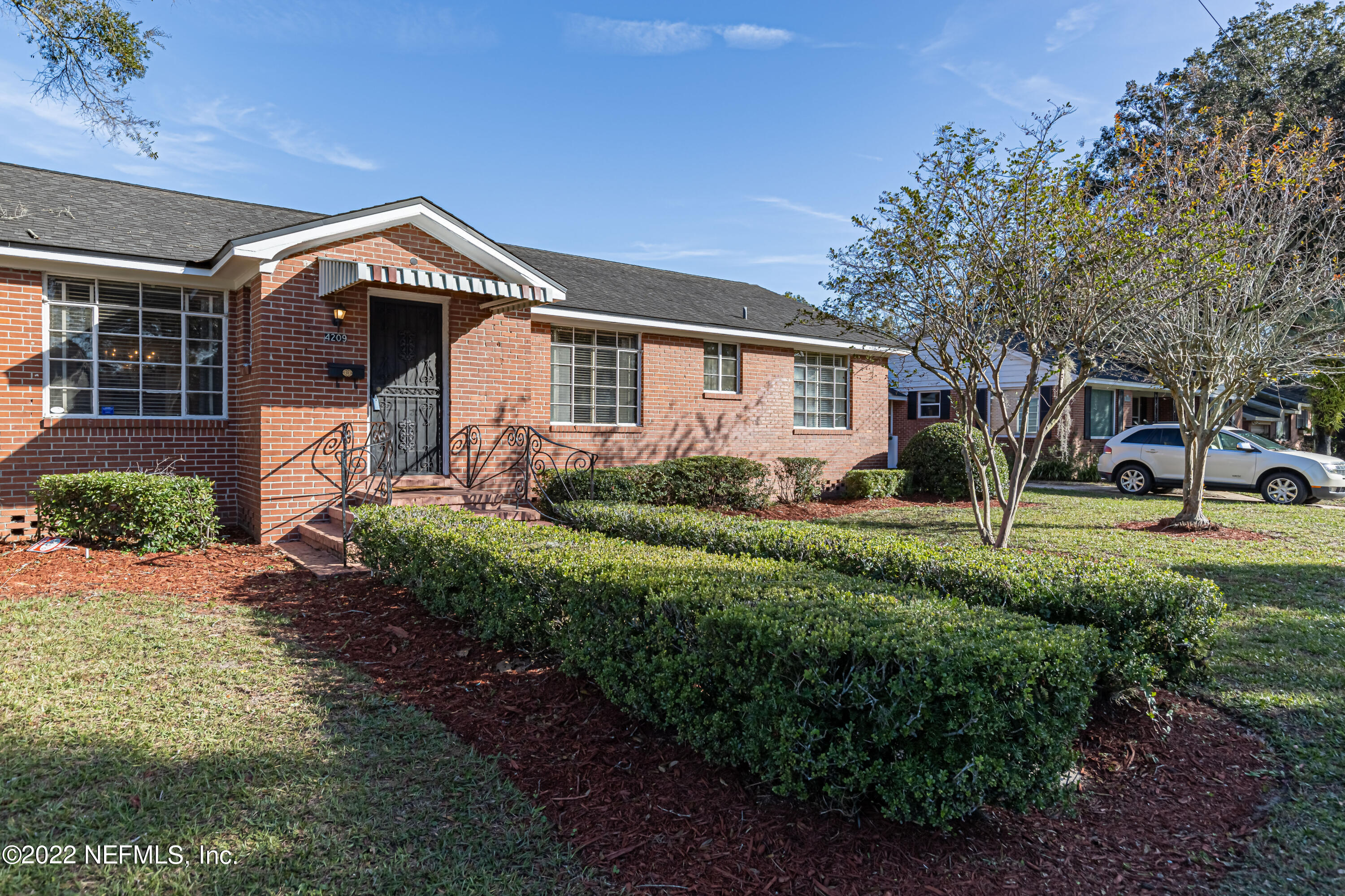 4209 Birmingham Road Jacksonville, FL 32207 - Photo 35 of 35 a front view of a house with garden