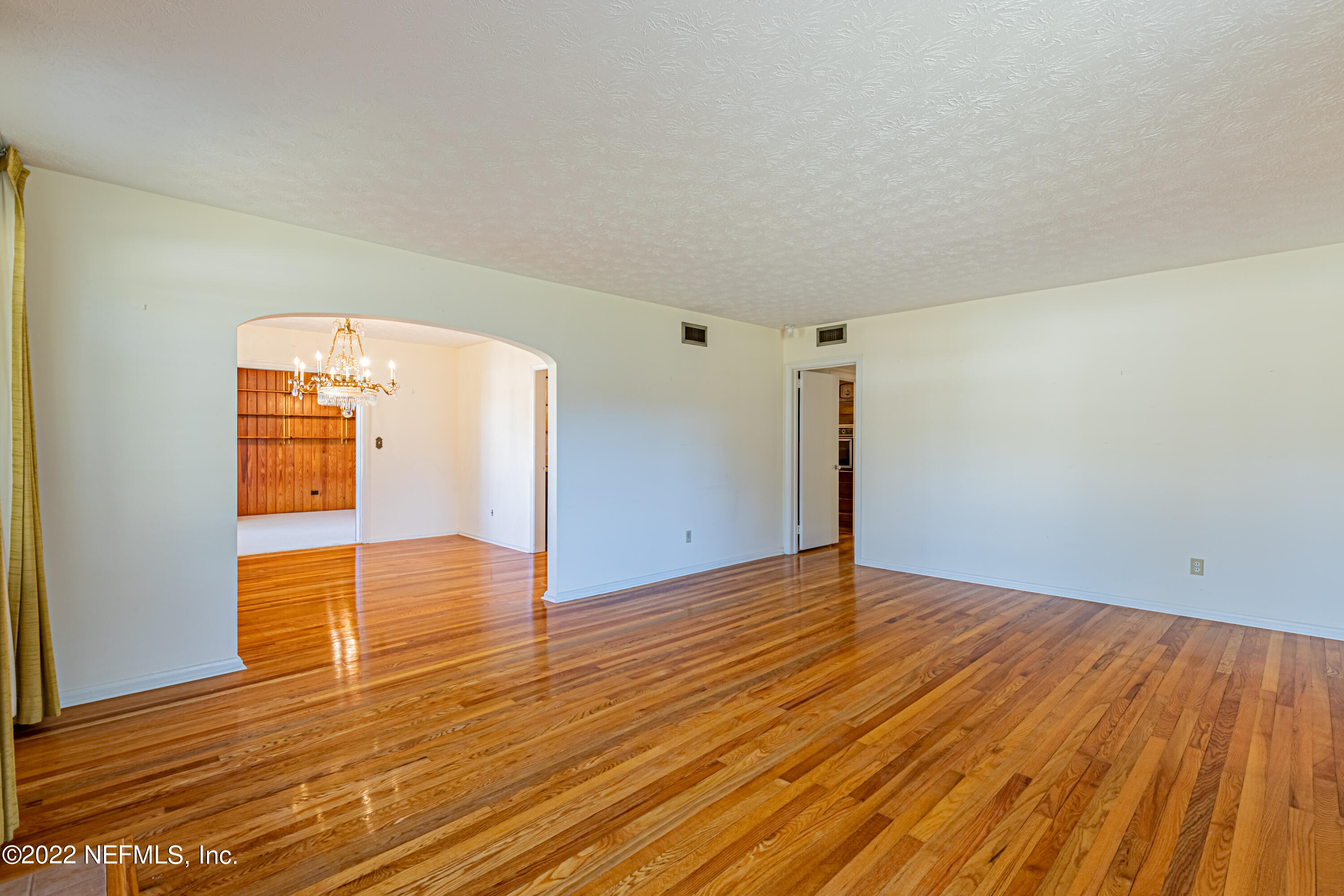 4209 Birmingham Road Jacksonville, FL 32207 - Photo 6 of 35 a view of empty room with wooden floor