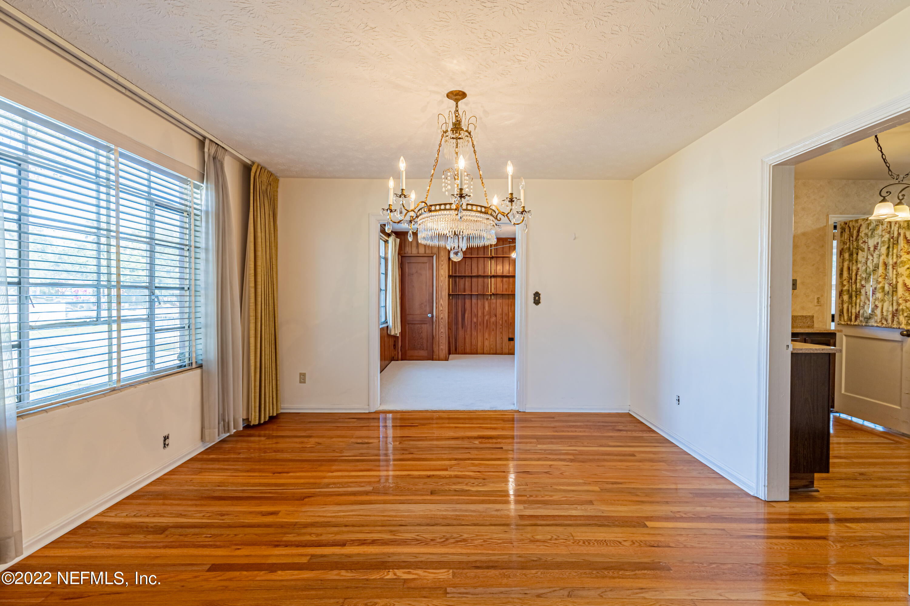 4209 Birmingham Road Jacksonville, FL 32207 - Photo 10 of 35 a view of empty room with wooden floor