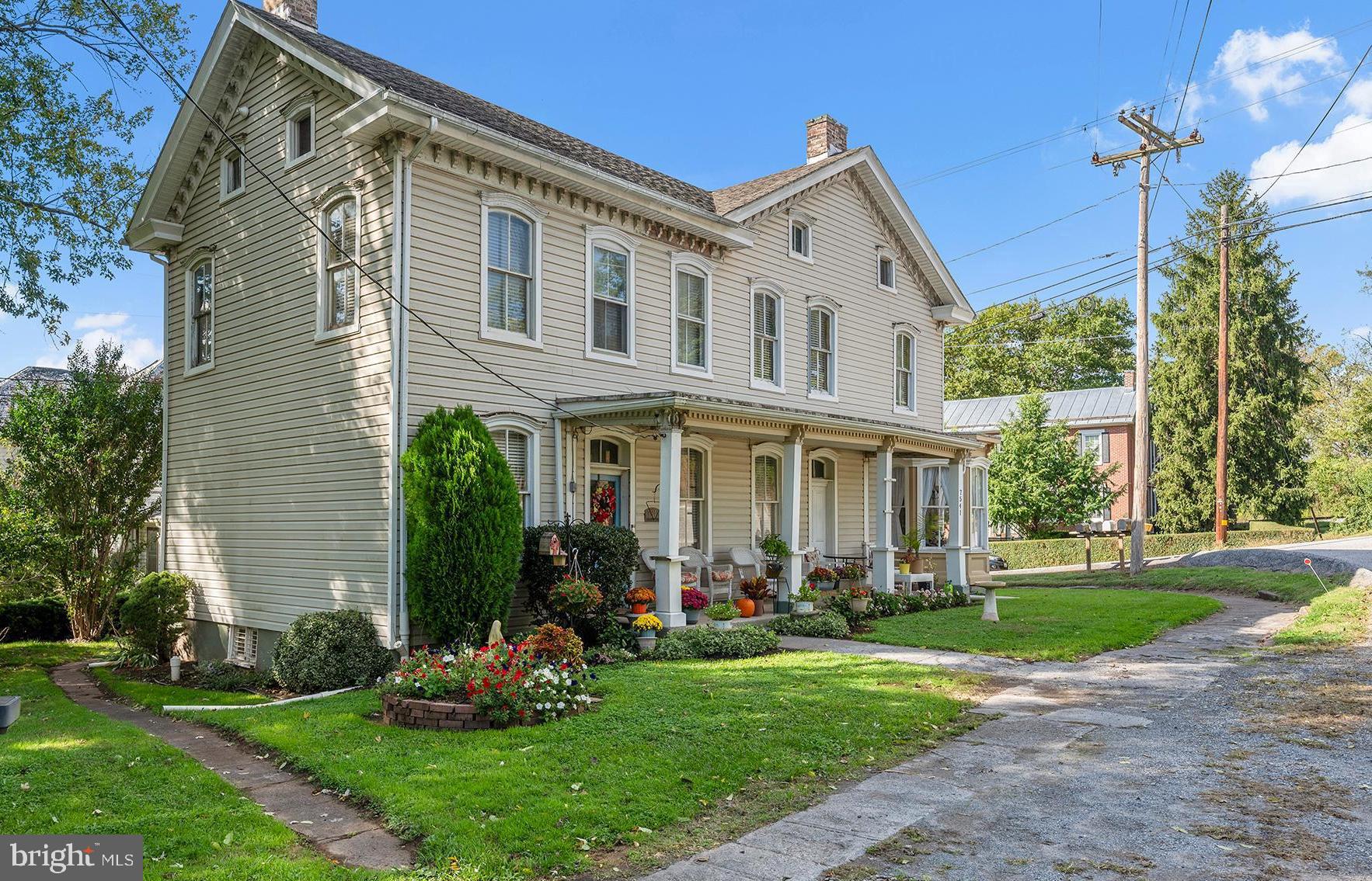 a front view of house with yard