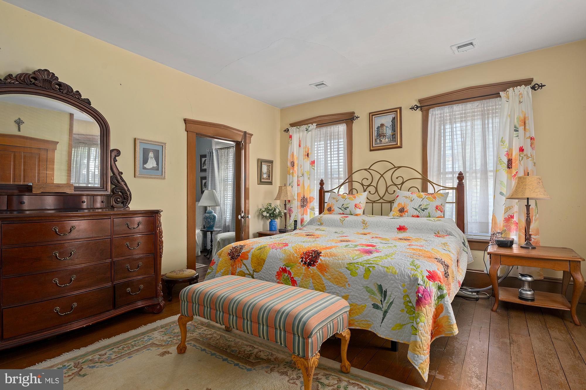 7541 Middleburg Road Keymar, MD 21757 - Photo 35 of 53 a bedroom with a bed and wooden floor