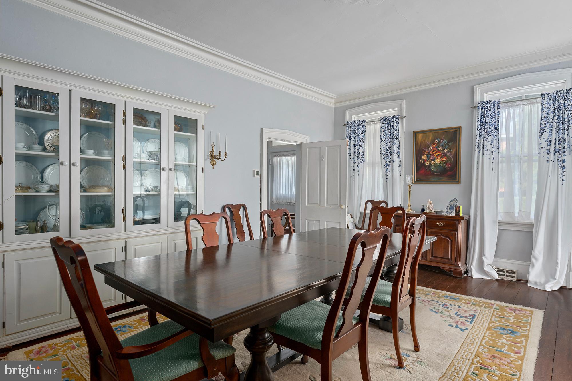 7541 Middleburg Road Keymar, MD 21757 - Photo 8 of 53 a view of a dining room with furniture and wooden floor