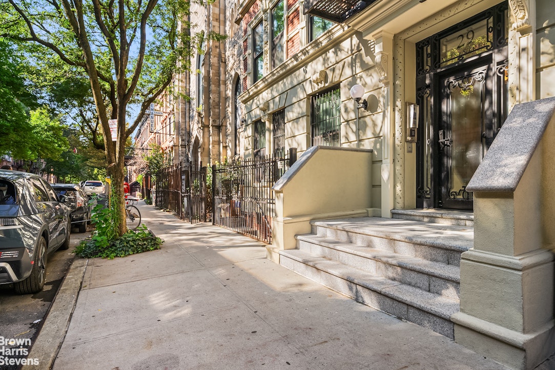 29 West 119th Street, Unit 3 Manhattan, NY 10026 - Photo 13 of 14 a view of a building with street