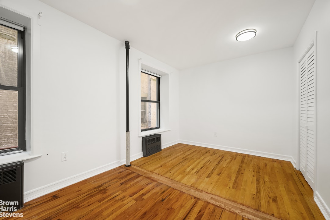29 West 119th Street, Unit 3 Manhattan, NY 10026 - Photo 8 of 14 a bedroom with a bed and a window