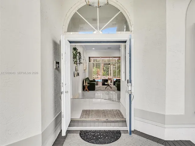 a view of a living room and window
