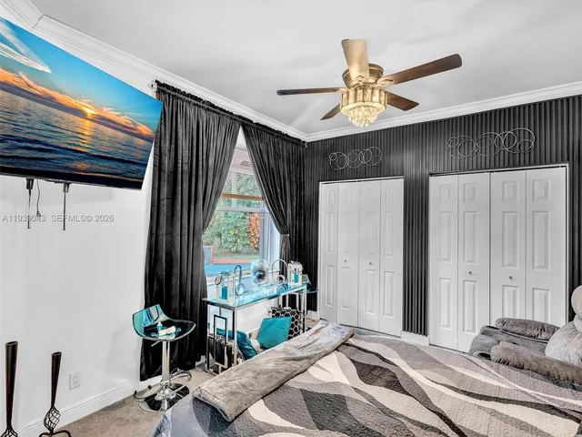 a view of a dining room with furniture and window