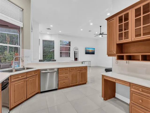 a view of a pool in the backyard of house