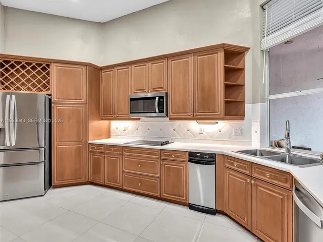 a view of a playground with basketball court