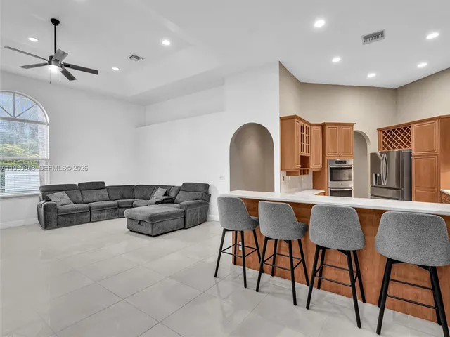 a view of a park with swings and slides