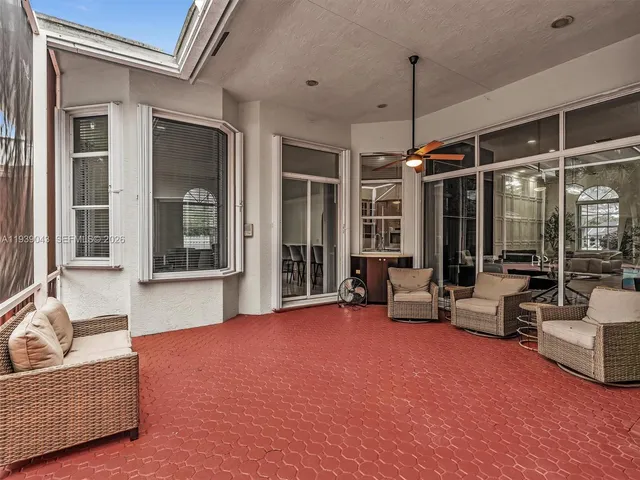 a view of a yard from a balcony