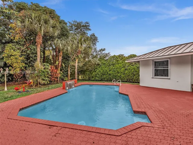 $940,000 | 8720 Northwest 18th Street, Coral Springs, FL 33071